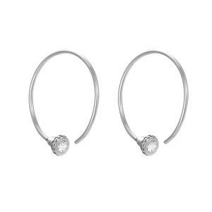 Detailed view of polished stainless steel hoop earrings with sparkling zircon pendant drops