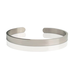 Detailed view of open minimalist titanium steel bracelet with a matte brushed finish