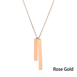 Detail of rose gold stainless steel O-chain with double vertical bar pendants