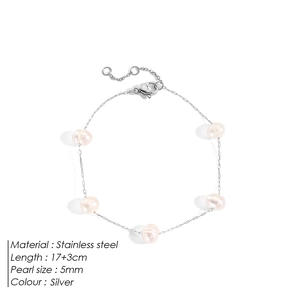 Flat lay of a silver stainless steel bracelet featuring five white 5mm freshwater pearls