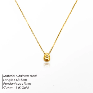 Detail of 14K gold plated stainless steel teardrop pendant necklace with a 7mm white zircon