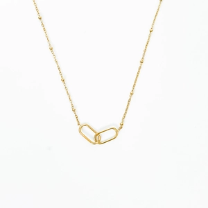 Minimalist gold necklace with interlocking oval link pendant and satellite bead chain