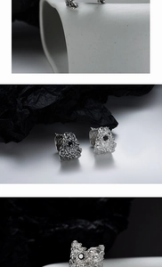 Macro detail of vintage S925 sterling silver ring featuring lava texture and black gemstone