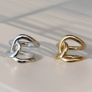 Minimalist double layer interlocking knot rings in polished gold and silver finishes