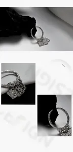 Macro detail of S925 sterling silver ring with molten lava texture and square charms