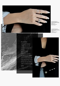 Macro shot of S925 sterling silver rings with textured square plate on model's hand