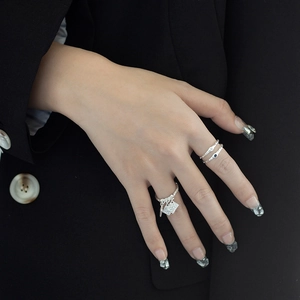 Three-piece S925 sterling silver ring set featuring textured square pendant and blue stone