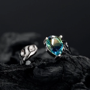 S925 sterling silver open ring with blue-green teardrop stone and lava texture finish