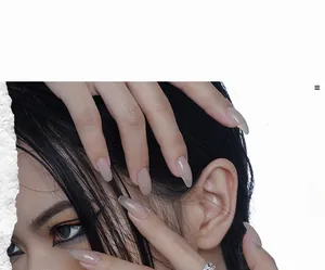 Detail of S925 sterling silver ring with black stone texture on Asian model hand