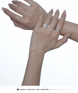 Detail showing irregular molten texture S925 silver rings with black zircon inlay