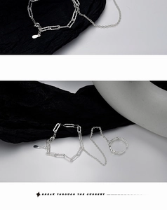 Detail of S925 sterling silver textured chain bracelet and matching ring set