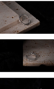 Makro-Detail von S925 Sterling Silber offenem Ring mit unregelmäßiger Bohnentextur