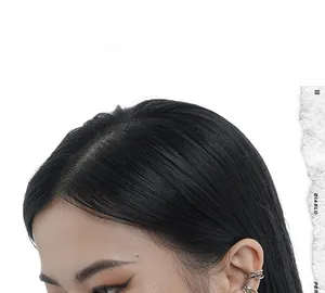 Detail of silver S925 sterling silver ear cuff with multi-layered irregular winding design