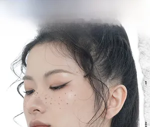 Close-up of minimalist S925 sterling silver ear studs on model with paper-cut effect