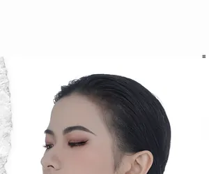 Portrait of female model wearing elegant asymmetric S925 silver long drop earrings
