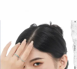 Close-up of S925 sterling silver enamel rings with wave texture on model hand