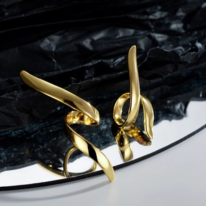 Asymmetric long line S925 sterling silver earrings with irregular gold twisted design