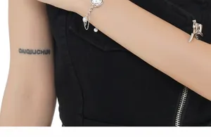 Close-up of S925 sterling silver bracelet with baroque pearls on model wrist