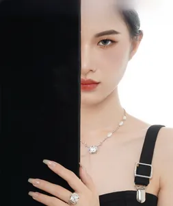 Baroque pearl jewelry set with liquid metal necklace and ring on elegant model