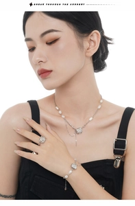 S925 silver jewelry set featuring baroque pearl necklace, ring and bracelet on a model