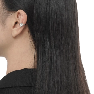 Elegant S925 sterling silver ear cuff with teardrop zircon on woman's ear