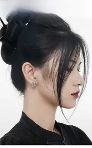Close-up of green aventurine tassel earring on model in New Chinese style