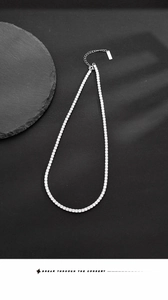 Detail of S925 sterling silver tennis necklace with square zircons and adjustable chain