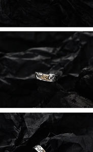 Macro shot of vintage S925 silver open ring with distressed texture and gold accents
