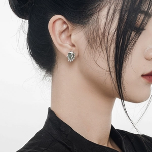 New Chinese style S925 silver stud earrings with green aventurine on a female model