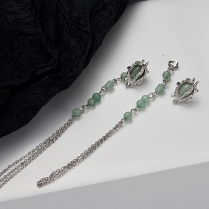 Silver fringe earrings with green aventurine jade beads in a minimalist tassel design