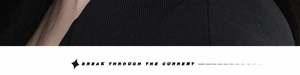 Detailed macro view showing premium black twill fabric and precise stitching of the jacket