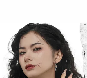 Gothic S925 silver ghost earring with orange zircon and white skull drop on female model