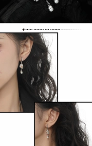 Detail of S925 silver ghost heart earrings with pearls and lava texture on models