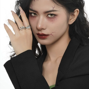 S925 sterling silver ghost ring with turquoise enamel inlay on a female model finger