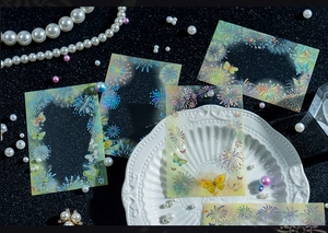 Close-up of holographic PET stickers with iridescent butterfly and firework patterns