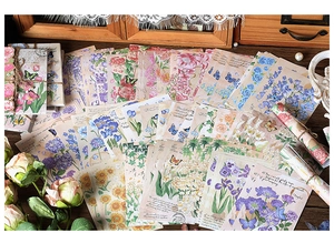 Detailed flat lay of vintage floral scrapbook stickers with flowers and retro ephemera