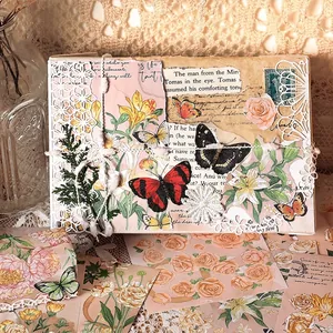 Vintage floral butterfly scrapbooking stickers with delicate lace edges on beige lace