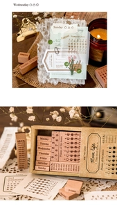 Macro detail of vintage wooden stamps set featuring moon phases and time for DIY scrapbooking