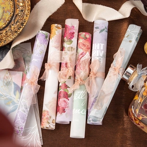 Floral scrapbooking paper set with watercolor designs and organza ribbons in vintage style
