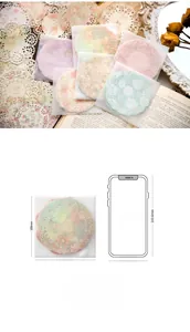 Macro shot of 100x100mm vintage lace paper stickers with butterfly and floral patterns