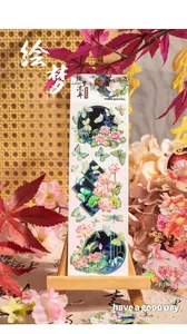 Detail of 3D rainbow crystal ink PET stickers with lotus and butterfly theme on a wooden stand
