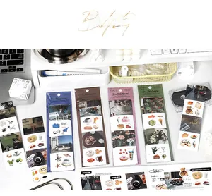 Detail showing 4 sheets of aesthetic life-style stickers in clear PET packaging for journaling