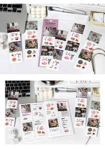 Macro shot of 6-sheet vintage stickers pack for bullet journals with floral and car motifs