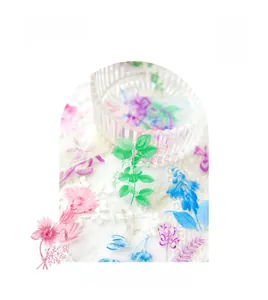 Detail of floral PET stickers with watercolor style flowers for DIY scrapbook decorating