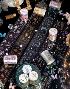 Detailed view of PET decorative tape featuring laser gold foil stamping and butterfly patterns