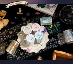 Detail of laser gold foil PET tape featuring butterfly and starry sky patterns