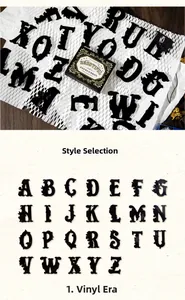 Close-up of black gothic vintage gold-foil alphabet stickers for journaling decoration