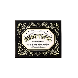 Vintage style black stationery box with gold foil lettering and classic vine patterns