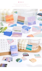 Artistic oil painting memo cards set with scenic nature illustrations on white desktop