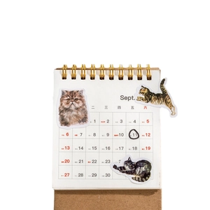 Diary cat stickers featuring hand-drawn kitten designs on a white spiral notebook